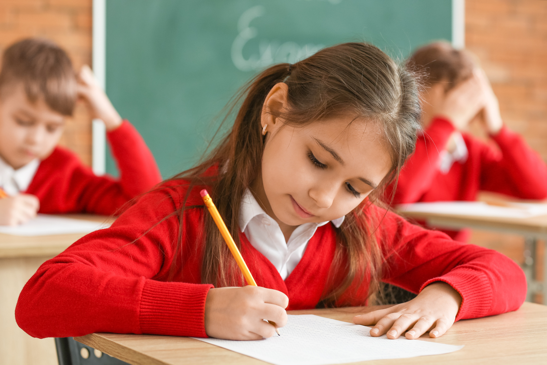 Pupils Taking Exam at School